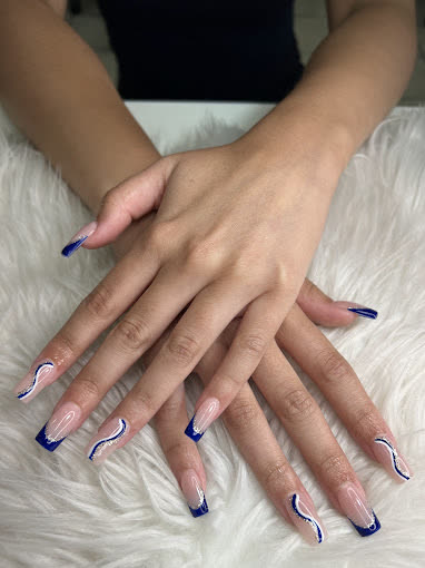 Cobalt-blue French coffin nails with white swirls